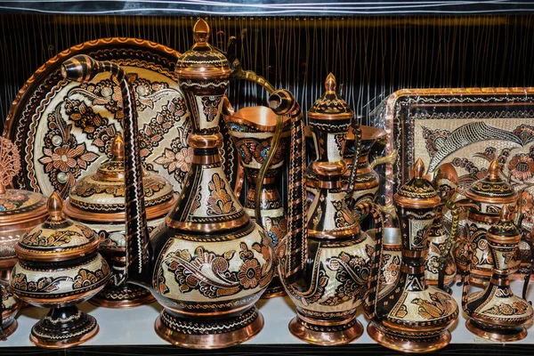 Turkish delight cups, pots, tea kettles and souvenirs are made of copper. Mostar city in Bosnia and Herzegovina. Local traditional handicraft tea and coffee pots and cups (Turkish style).