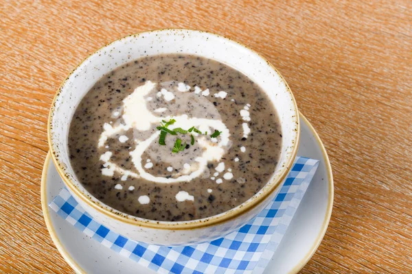 Mushroom cream soup. Chanterelle cream soup on wooden background, selective focus — Stock Image Mushroom Cream Soup Chanterelle Cream Soup Wooden Background Selective Focus Royalty Free Stock Images