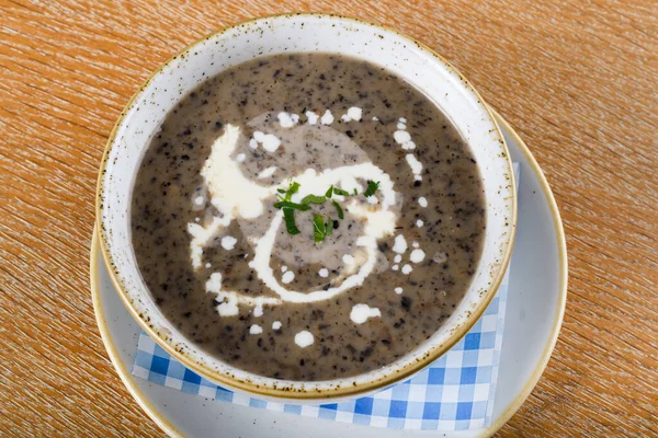 Mushroom cream soup. Chanterelle cream soup on wooden background, selective focus — Stock Image Mushroom Cream Soup Chanterelle Cream Soup Wooden Background Selective Focus Royalty Free Stock Images
