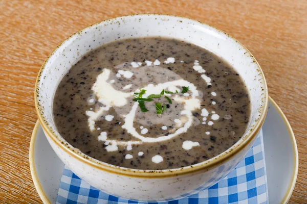 Mushroom cream soup. Chanterelle cream soup on wooden background, selective focus — Stock Image Mushroom Cream Soup Chanterelle Cream Soup Wooden Background Selective Focus Royalty Free Stock Images