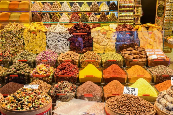 Istanbul, Turkey, 20.12.2019: Grand Bazaar varied produce fr sale: spices, condiments, teas, dried fruits, cheeses on the counter top of the market