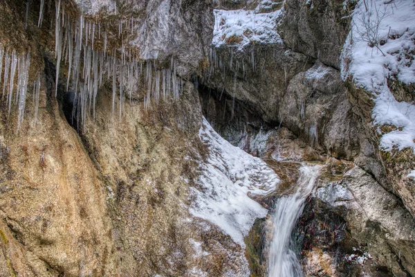 Large stalactites with ice in the mountains on a rock , slovakia mala fatra — 스톡 사진