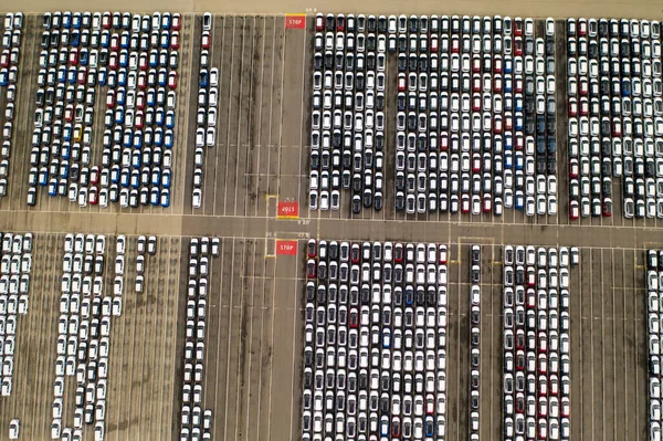 aerial view of big parking lot of new cars from car factory in slovakia , kia 08.03.2020