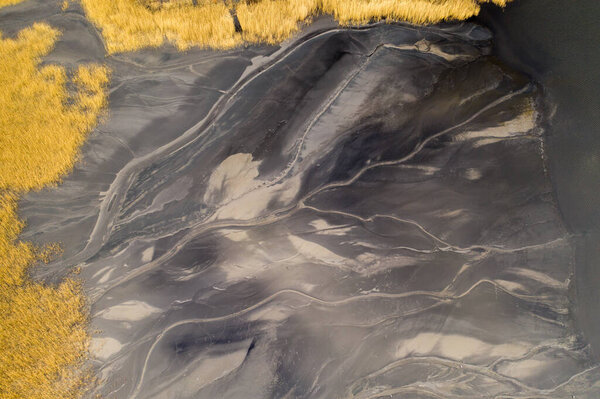 aerial shot of black coal mud settling pond, karvina czech