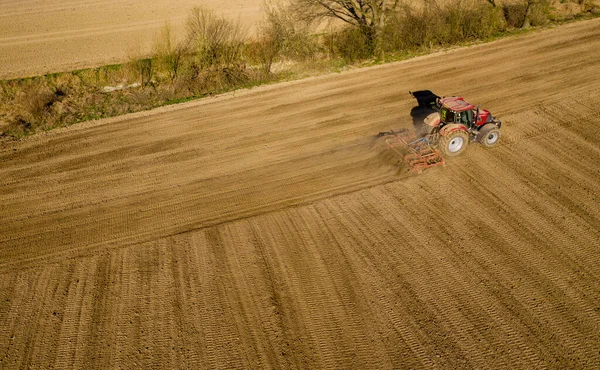 Aerial Shot Farmer Tractor Preparing Land Seedbed Cultivator Morning Sun — Stock Photo, Image