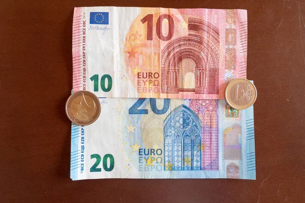 banknotes and coins of European currency Euro, Eur 10 20