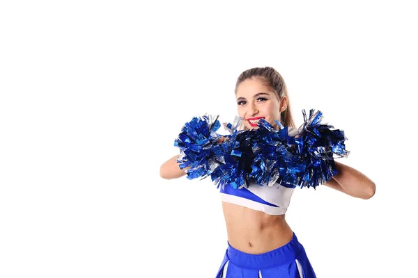 Joven animadora en traje azul y blanco con pompones sobre fondo blanco . — Foto de Stock