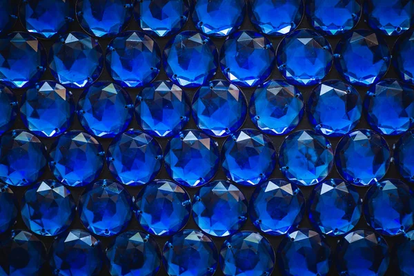 Precious sparkling rhinestones blue colors on a dark background — Stock Photo, Image