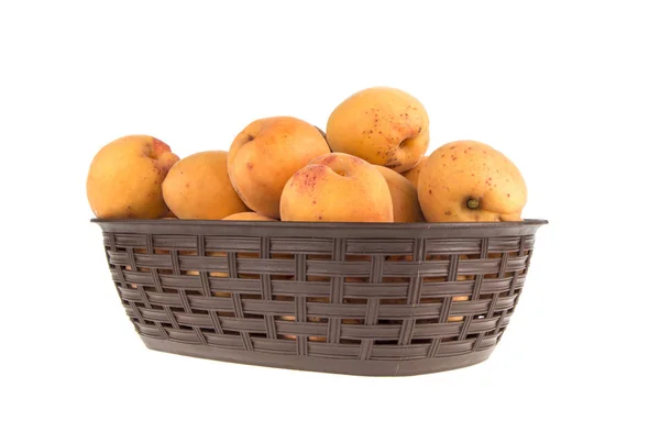 Apricot's in basket on white background — Stock Photo, Image