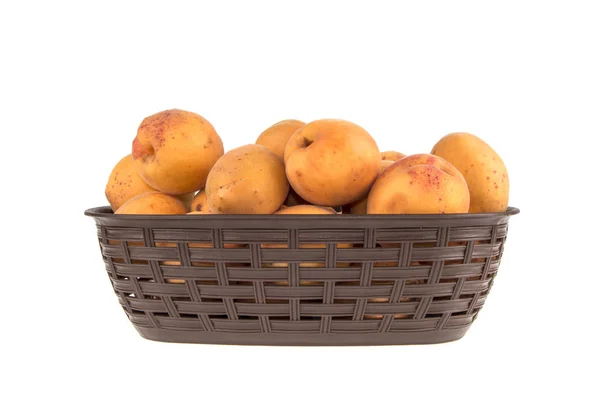 Apricot's in basket on white background — Stock Photo, Image