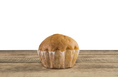 ahşap masa üzerinde küçük kek