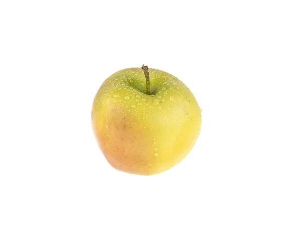 Manzana húmeda amarilla sobre un fondo blanco — Foto de Stock