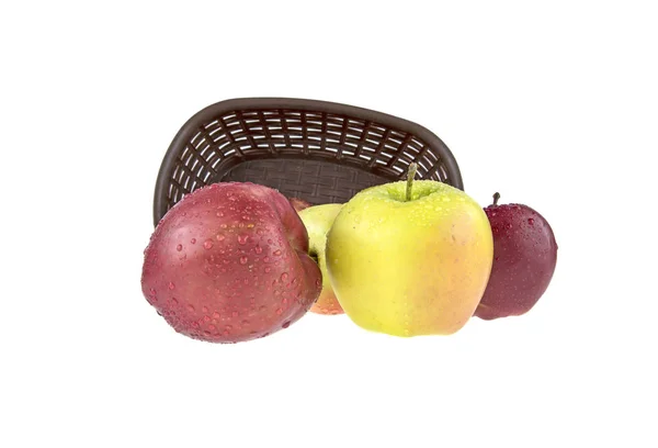 Wet, clean apples in a basket on a white background — Stock Photo, Image