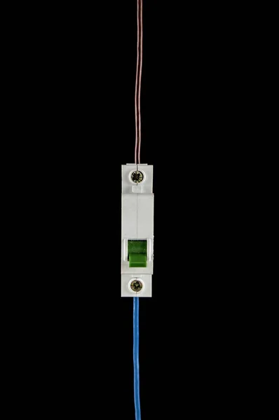 Interruptor elétrico automaticamente em um fundo isolado preto — Fotografia de Stock