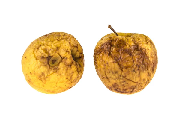 Dos manzanas podridas sobre fondo blanco aislado —  Fotos de Stock