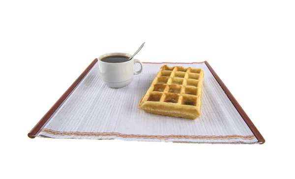 Una tazza di caffè e waffle belgi — Foto Stock