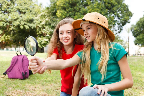 We exploring the nature with magnifying glass — Stock Photo, Image