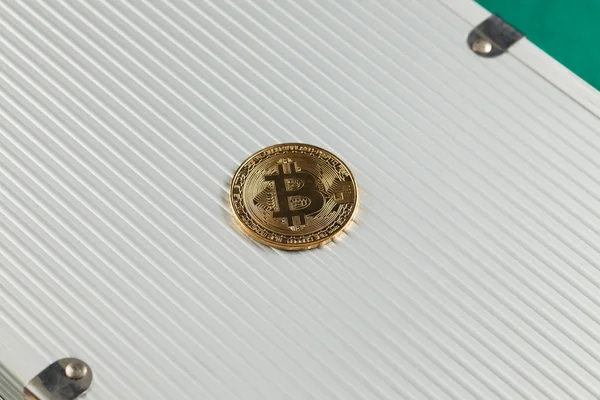 Bitcoin on the aluminum briefcase — Stock Photo, Image