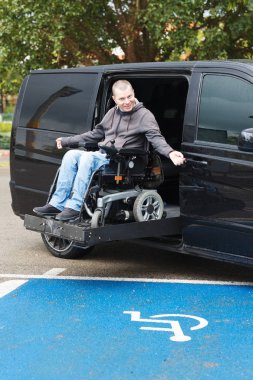 Disabled man on wheelchair lift clipart