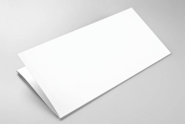 Kağıt veya Antetli gri arka plan üzerinde katlanmış sayfa boş