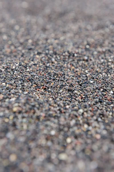 Czarnym wulkanicznym piaskiem — Zdjęcie stockowe