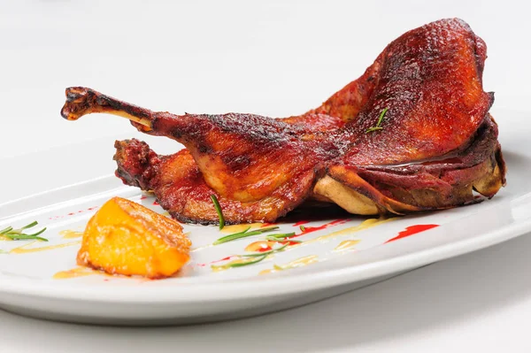 Roast half of duck with caramelized lemon — Stock Photo, Image