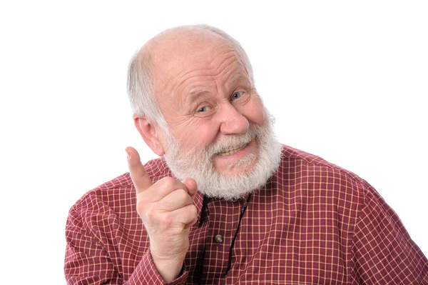 Senior man toont wijsvinger gebaar, geïsoleerd op wit — Stockfoto