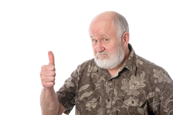 Senior man toont duimschroef opwaarts gebaar, geïsoleerd op wit — Stockfoto