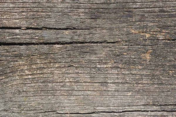 De leeftijd van de oude houten planken, textuur met natuurlijke patroon — Stockfoto