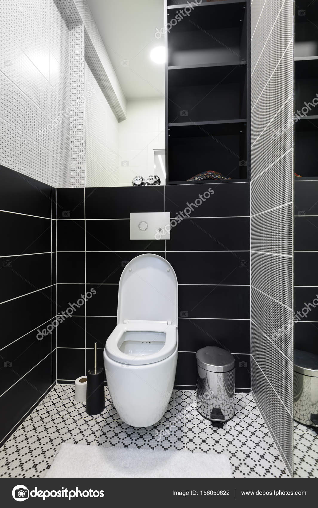 https://st3.depositphotos.com/1301843/15605/i/1600/depositphotos_156059622-stock-photo-modern-black-and-white-toilet.jpg