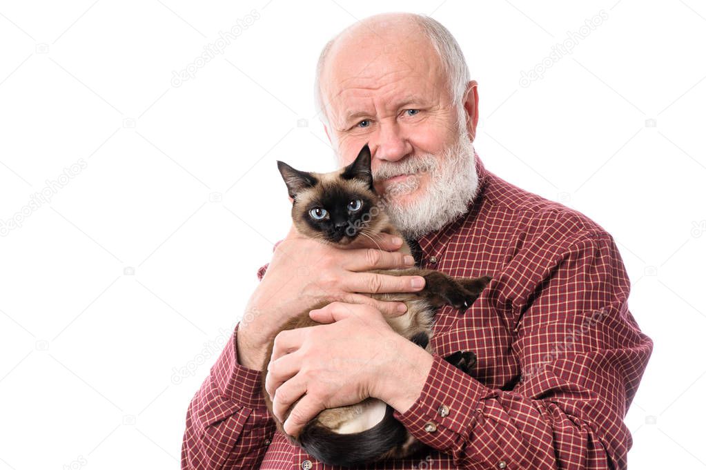 Cheerfull senior man with cat isolated on white