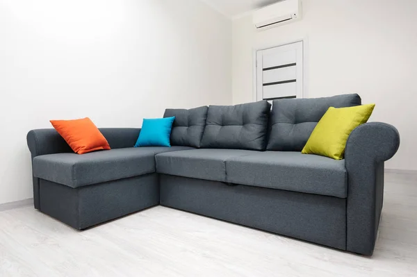 White living room with grey sofa — Stock Photo, Image