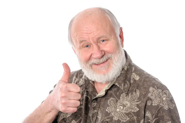 Uomo anziano mostra pollice in su gesto, isolato su bianco — Foto Stock