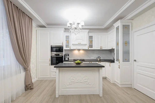 White luxury modern kitchen with island — Stock Photo, Image