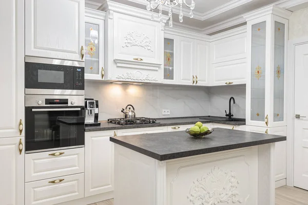 White luxury modern kitchen with island — Stock Photo, Image