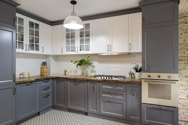 Modern grey and white wooden kitchen interior — Stock Photo, Image