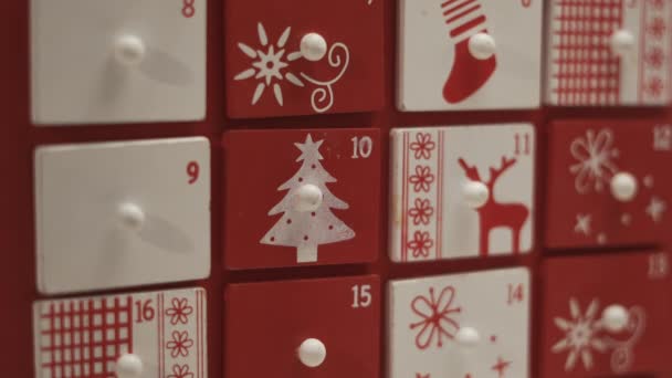 Close Hands Little Boy Takes Sweet Advent Calendar House Form — Vídeo de stock