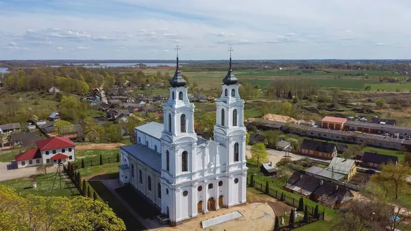Aerial View of the Roman Catholic Church in Ludza, Latvia. Sunny Spring Da
