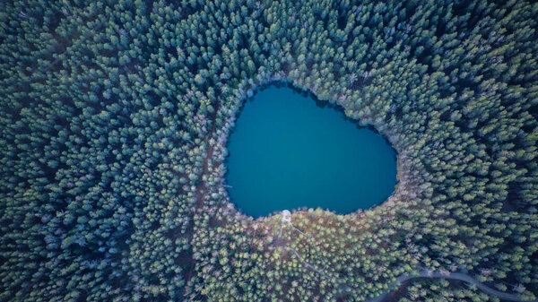Aerial View of the Devil Lake Velnezers , Cortoks or Chortock Lake. A Transparent Velnezers Lake is 17 Meters Deep and Located the  Latgale Aglona, Latvia .