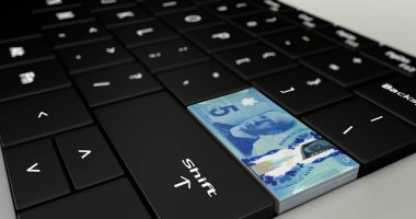 Kanada 5 doları düğme üstünde laptop klavye.
