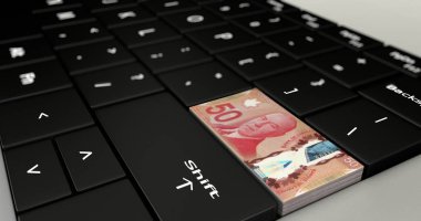Kanada 50 Doları düğme üstünde laptop klavye.