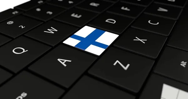 Finnlandfahne auf Laptop-Tastatur. — Stockfoto