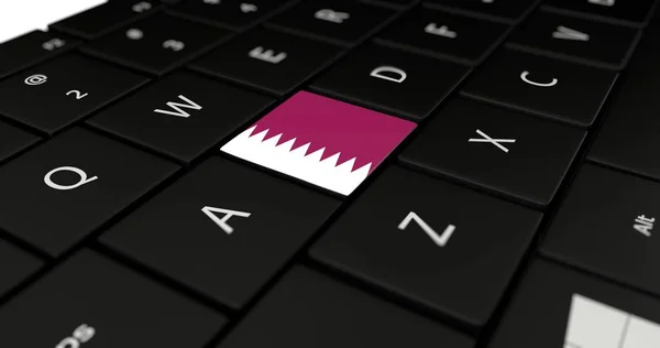 Qatars flagga knappen på laptop tangentbord. — Stockfoto