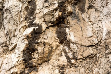 Doğal katmanlı kireçtaşı yüzey kayası, taş ocağı kireç taşı, kireç taşı tepesi dokusu