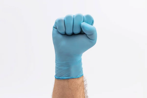 Punho Mão Luva Protetora Látex Azul Médica Segurando Uma Máscara — Fotografia de Stock