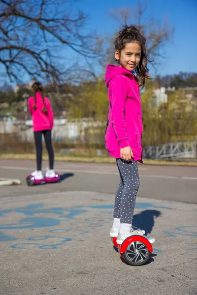 Girl on the hoverboard — Stock Photo, Image