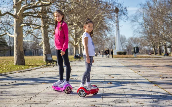Girls on the hoverboard — Stock Photo, Image