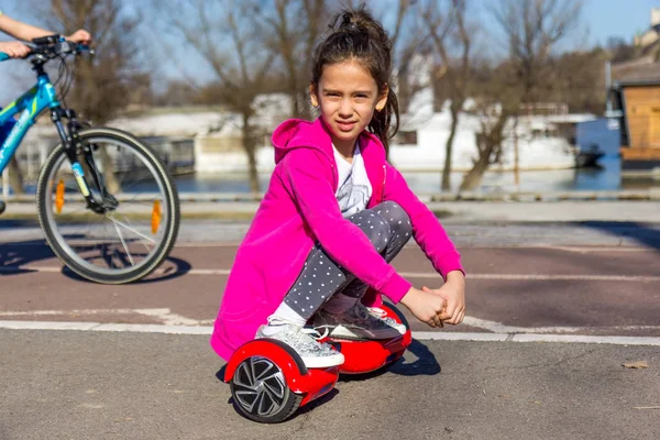 Girl on the hoverboard — Stock Photo, Image