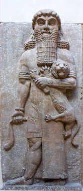 Kahraman, Louvre Müzesi 'nde bir aslanı yeniyor.