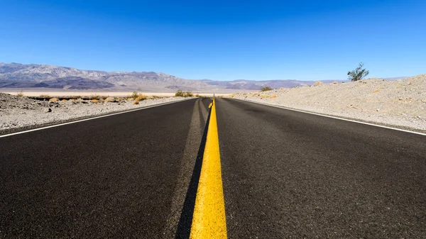 Empty road in Death Valley, California, USA